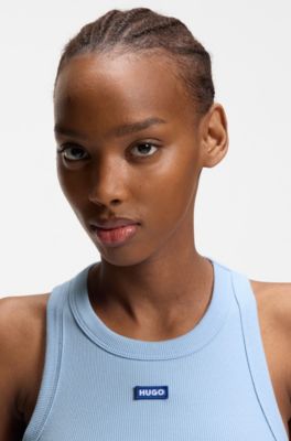 D&eacute;bardeur court en coton stretch avec &eacute;tiquette logo bleue, bleu clair