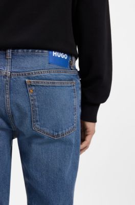 Jeans slim fit de denim el&aacute;stico en azul medio, Azul oscuro