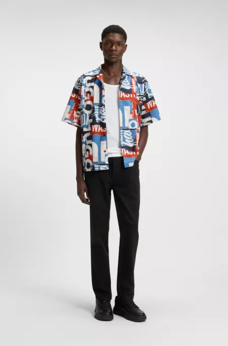 Black tapered-fit jeans in stretch denim