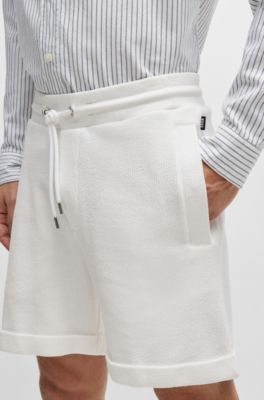 BOSS - Oversize-fit shorts with silver-tone trims 