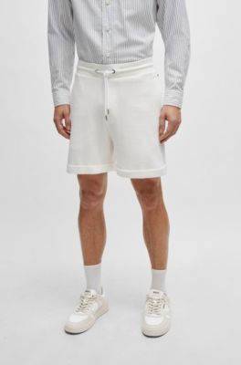 BOSS - Oversize-fit shorts with silver-tone trims 