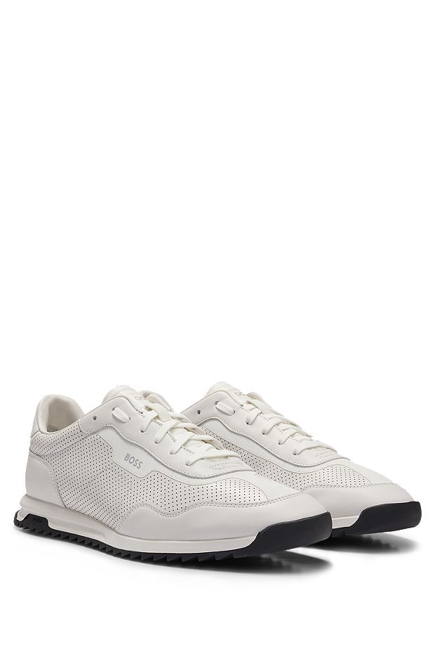 Low-top trainers in perforated leather, White