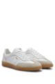 Leather and suede trainers with embossed logos, White