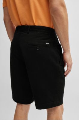 Shorts slim fit de sarga de algod&oacute;n el&aacute;stico, Negro