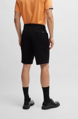 Shorts slim fit de sarga de algod&oacute;n el&aacute;stico, Negro