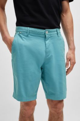 Shorts slim fit de sarga de algod&oacute;n el&aacute;stico, Celeste