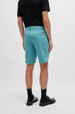 Shorts slim fit de sarga de algod&oacute;n el&aacute;stico, Celeste