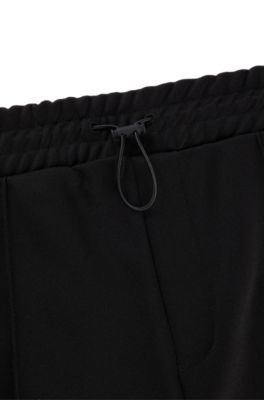 Pantalones de ch&aacute;ndal relaxed fit con bloques de color, Negro