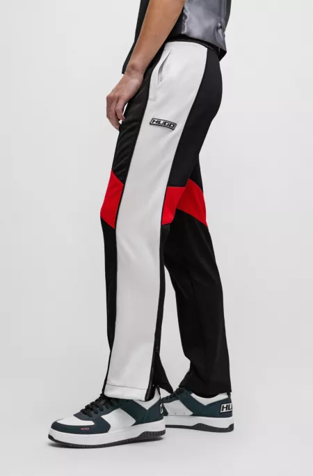 Relaxed-fit tracksuit bottoms with color-blocking