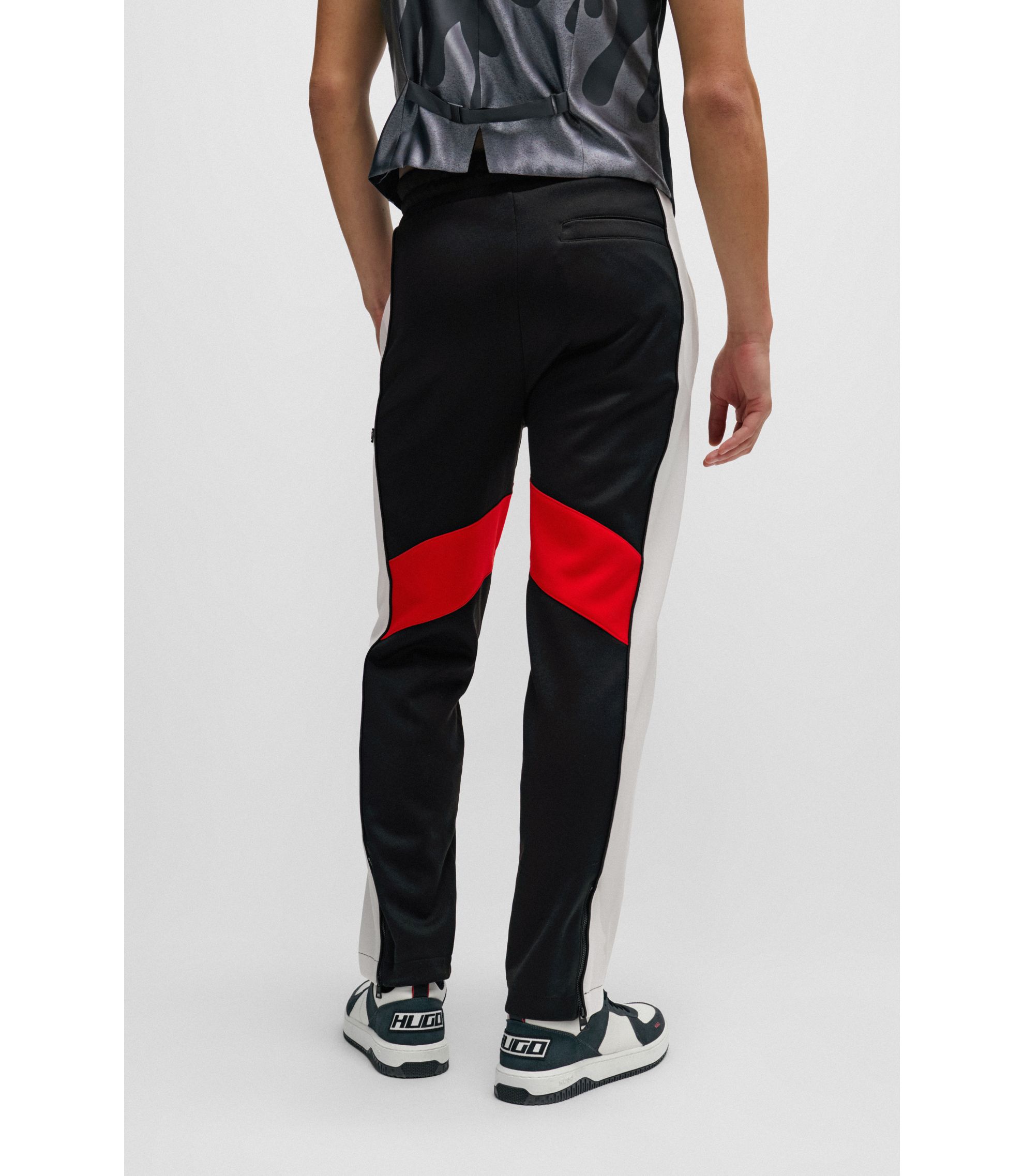 HUGO - Relaxed-fit tracksuit bottoms with color-blocking - Black