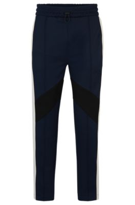 HUGO - Relaxed-fit tracksuit bottoms with color-blocking