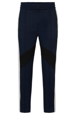 Hugo Boss Relaxed-fit Tracksuit Bottoms With Color-blocking In Dark Blue