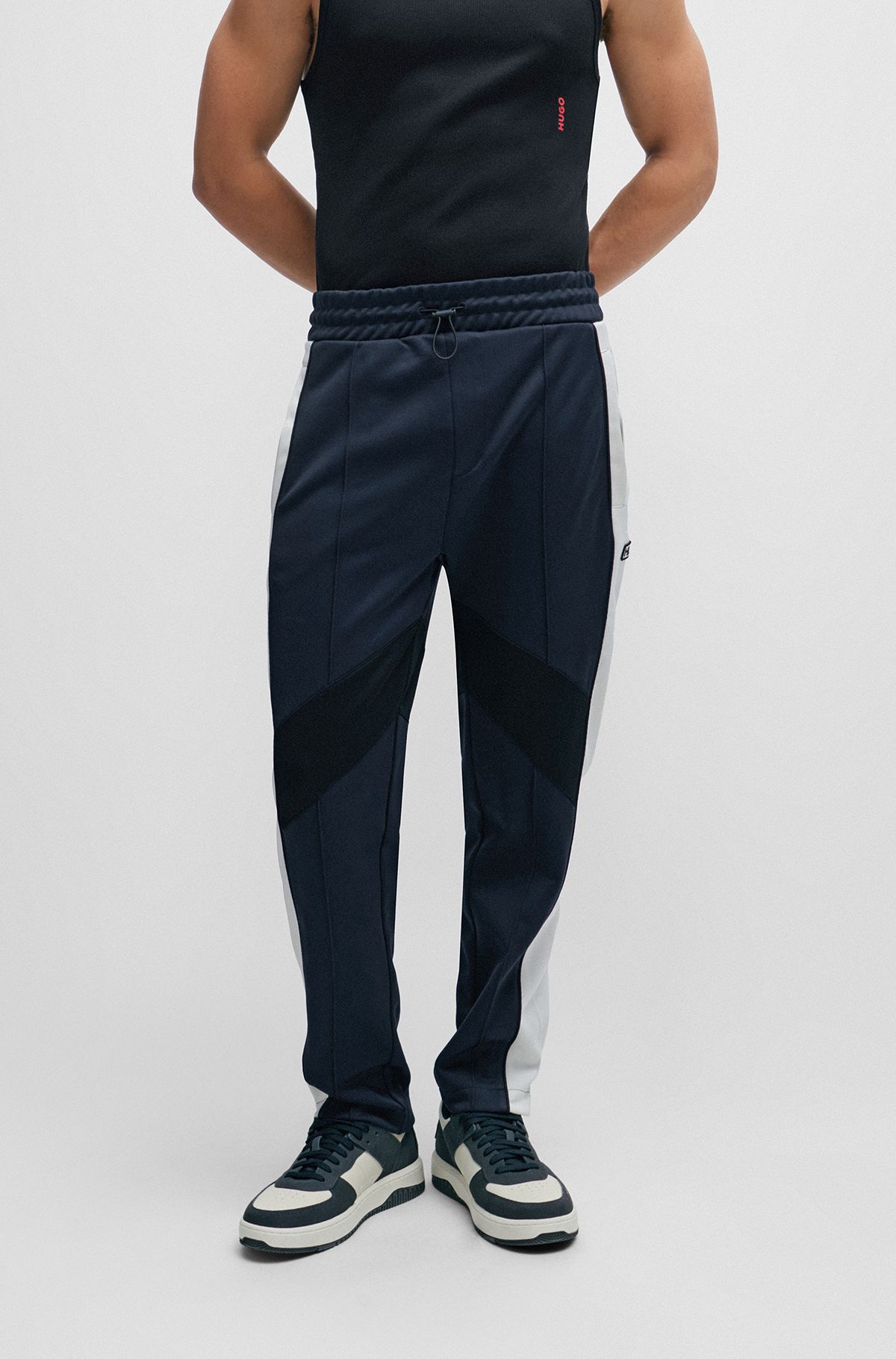 Relaxed-fit tracksuit bottoms with color-blocking, Dark Blue