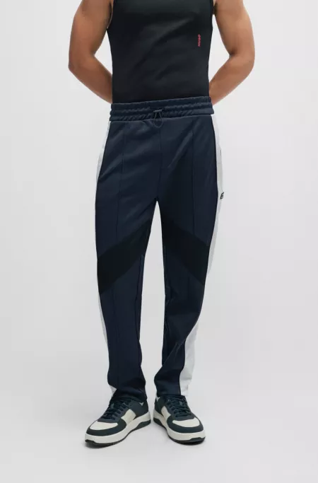 Relaxed-fit tracksuit bottoms with color-blocking