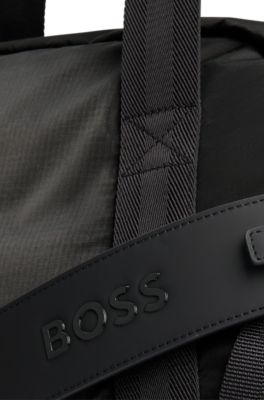 Coated-velour holdall with outline logo and adjustable strap, Black