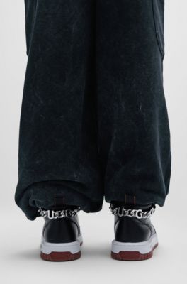 High-top trainers with logo-chain trim, Black