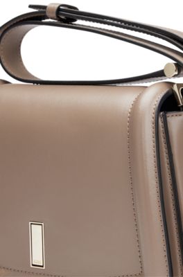 Leather saddle bag with branded hardware, Beige