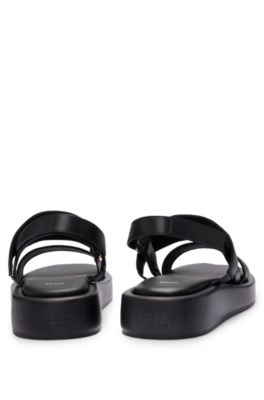 Leather sandals with eyelet details, Black