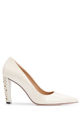 Leather pumps with monogram-patterned heels, White