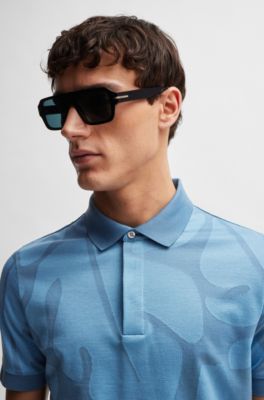 Polo slim fit de algod&oacute;n con hojas de monstera, Celeste