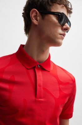 Polo slim fit de algod&oacute;n con hojas de monstera, Rojo