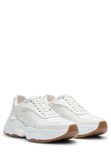 Leather trainers with chunky profile and gold-tone logo, White
