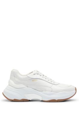 Leather trainers with chunky profile and gold-tone logo, White