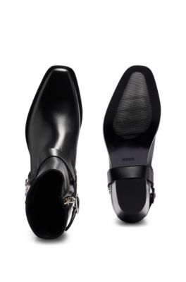 Ankle boots in leather with metallic stacked-logo trim, Black