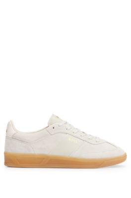 Suede trainers with embossed gold-tone logo, Light Grey