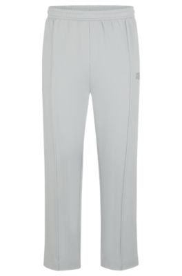 Hugo Boss Tracksuit Bottoms With Logo Artwork In Light Grey
