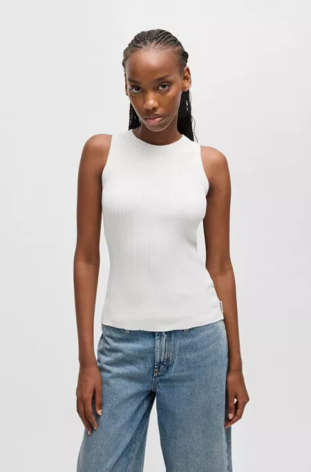 Slim-fit sleeveless top with irregular ribbed structure