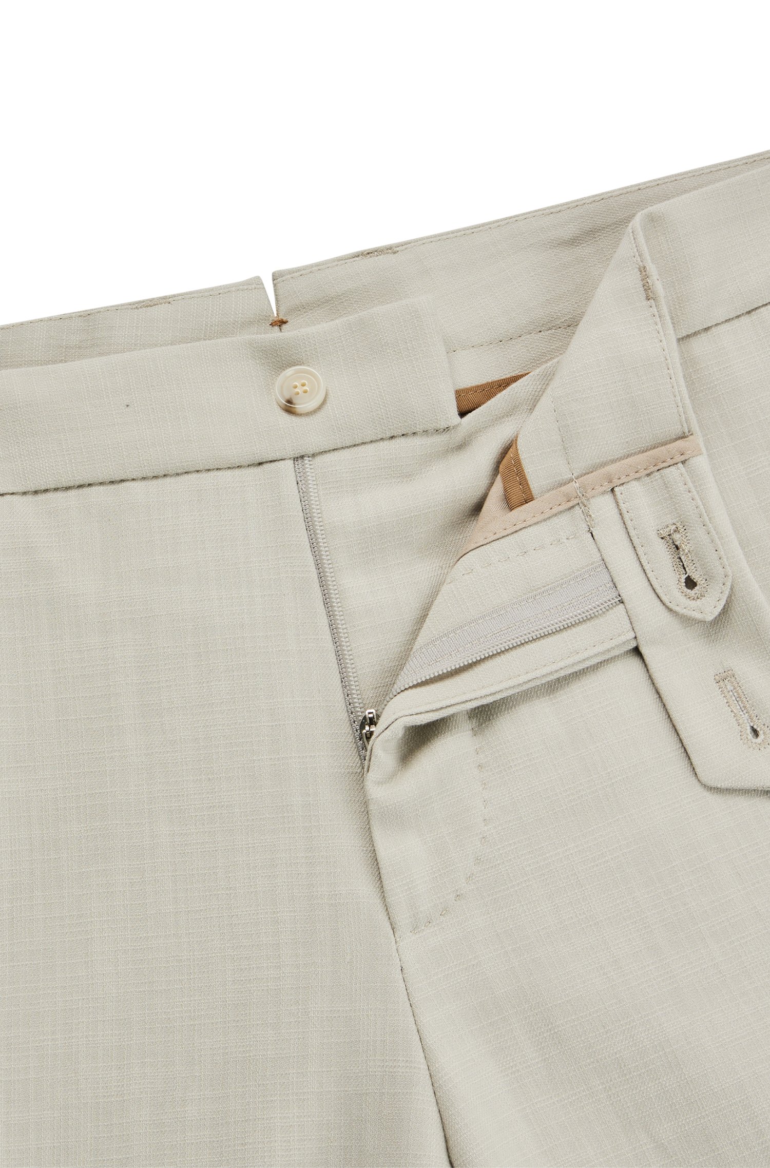Pantalones slim fit de material elástico con microestampado