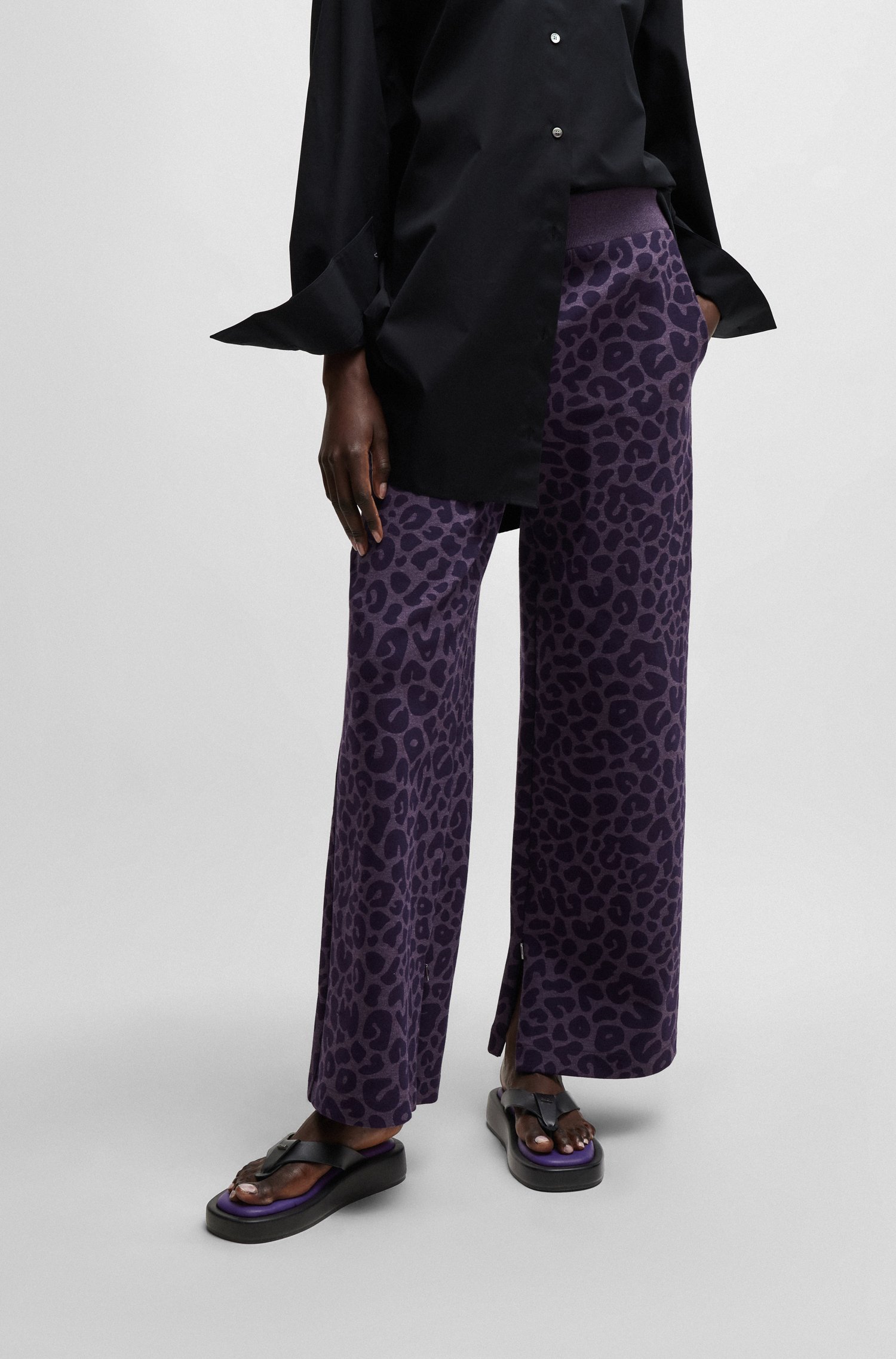 NAOMI x BOSS tracksuit bottoms with leopard print