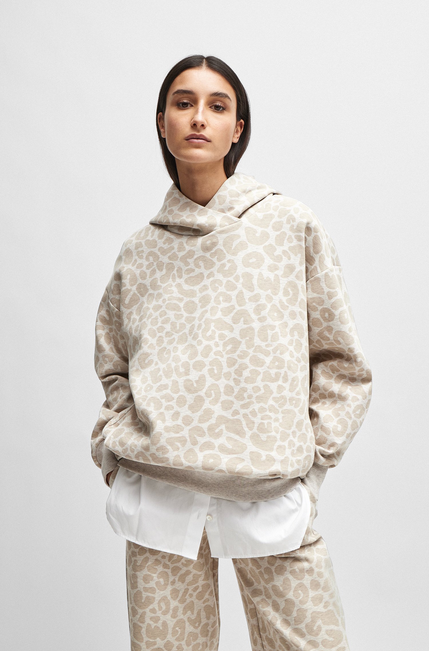 NAOMI x BOSS longline hoodie with leopard pattern