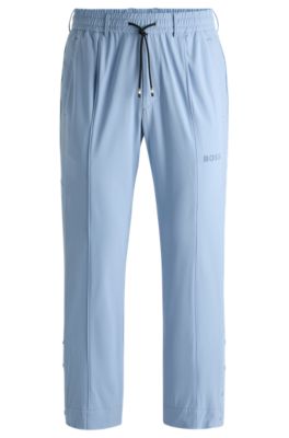 Hugo Boss Relaxed-fit Trousers With Double-monogram Badge In Light Blue