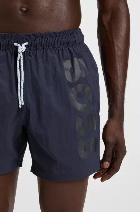 Quick-dry swim shorts with vertical logo print