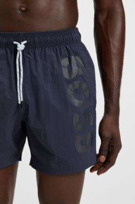 Ba&ntilde;ador en tejido de secado r&aacute;pido con logo vertical estampado, Azul oscuro