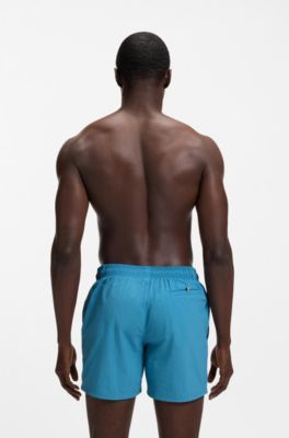 Quick-dry swim shorts with vertical logo print, Turquoise