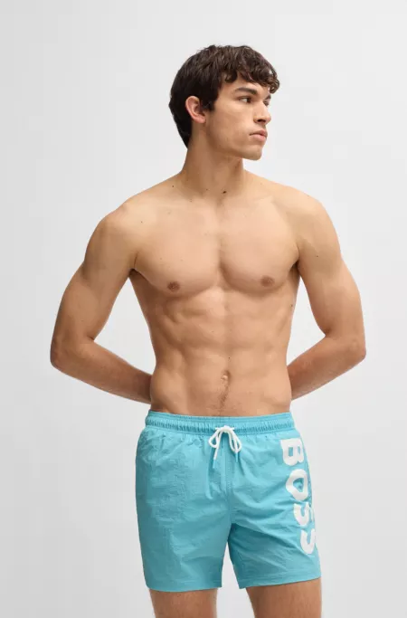 Quick-dry swim shorts with vertical logo print