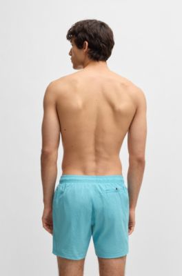 Ba&ntilde;ador en tejido de secado r&aacute;pido con logo vertical estampado, Celeste