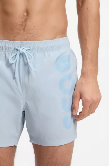 Quick-dry swim shorts with vertical logo print