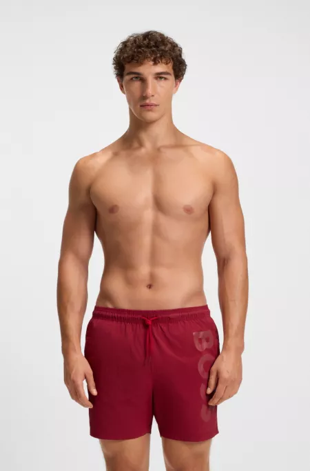 Quick-dry swim shorts with vertical logo print