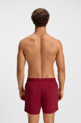 Quick-dry swim shorts with vertical logo print, Red