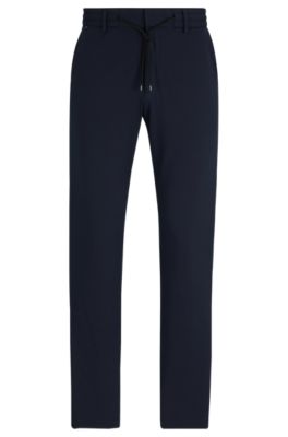Shop Hugo Boss Slim-fit Trousers In Performance-stretch Seersucker In Dark Blue