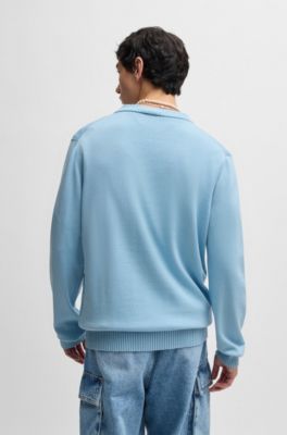 Pull en maille de coton avec &eacute;tiquette logot&eacute;e bleue, bleu clair