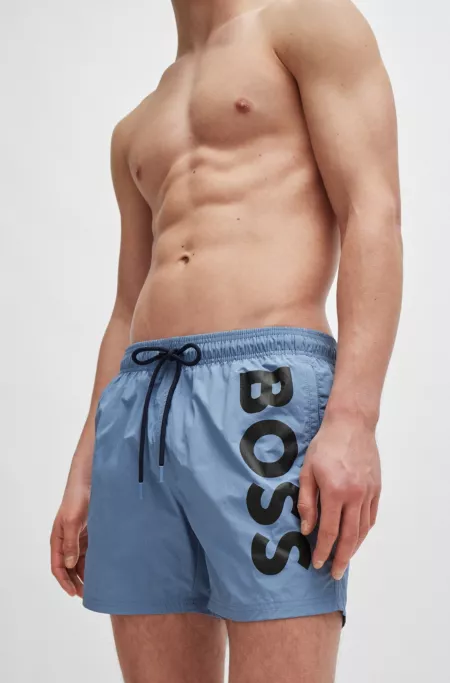Fully lined swim shorts with logo print