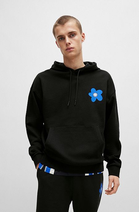 Cotton-terry regular-fit hoodie with flower artwork, Black