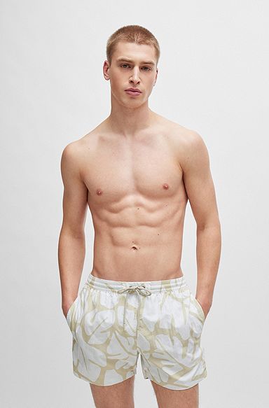 Quick-dry swim shorts with seasonal pattern, White
