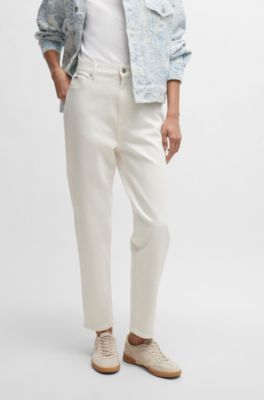 Vaqueros de denim el&aacute;stico color crema, Blanco