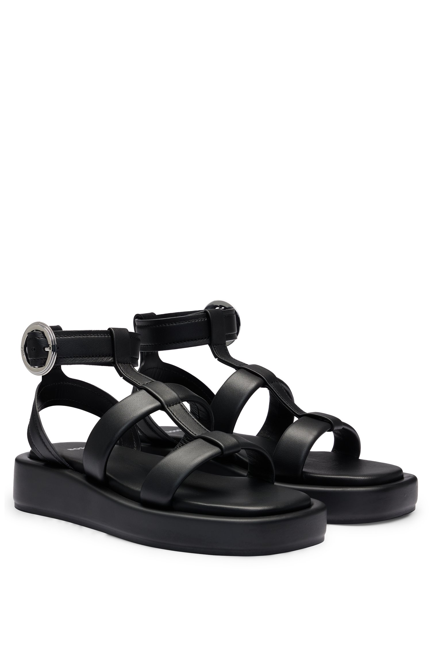 Platform leather sandals with branded buckle closure